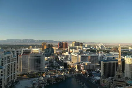 Stunning Las Vegas skyline at daybreak showcasing notable casinos and landmarks.