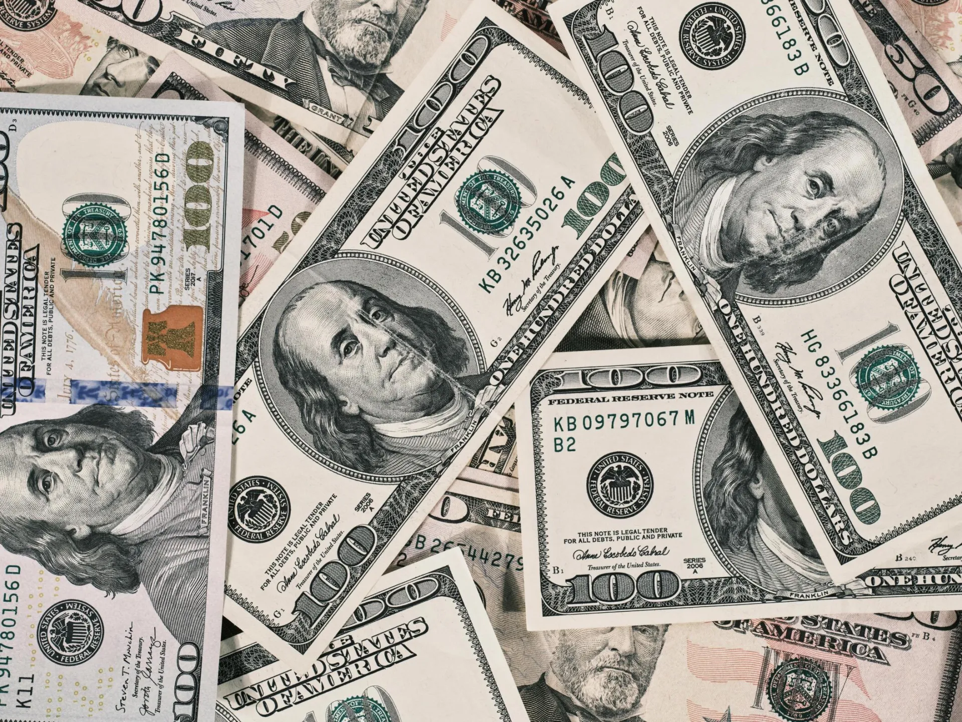Detailed close-up of US dollar bills highlighting wealth and finance concepts.