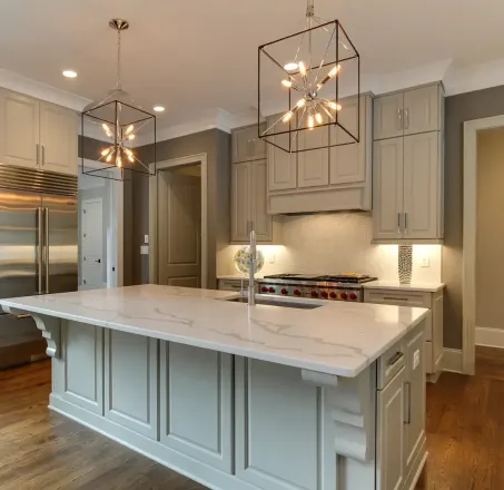A sleek modern kitchen with contemporary cabinets and high-end appliances.