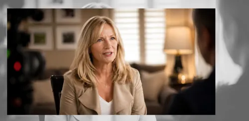 Debbie Fox interview by TV Reporter located in her livingroom.