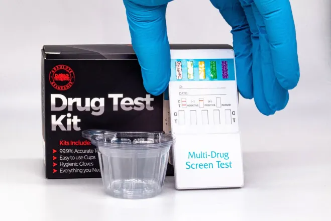 A detailed view of a drug test kit used in laboratory settings for health and safety screening.