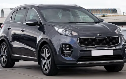 Stylish Kia Sportage SUV parked outdoors, showcasing modern design.