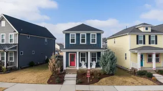 Aerial view of charming suburban homes in Wendell, NC, showcasing modern architecture.