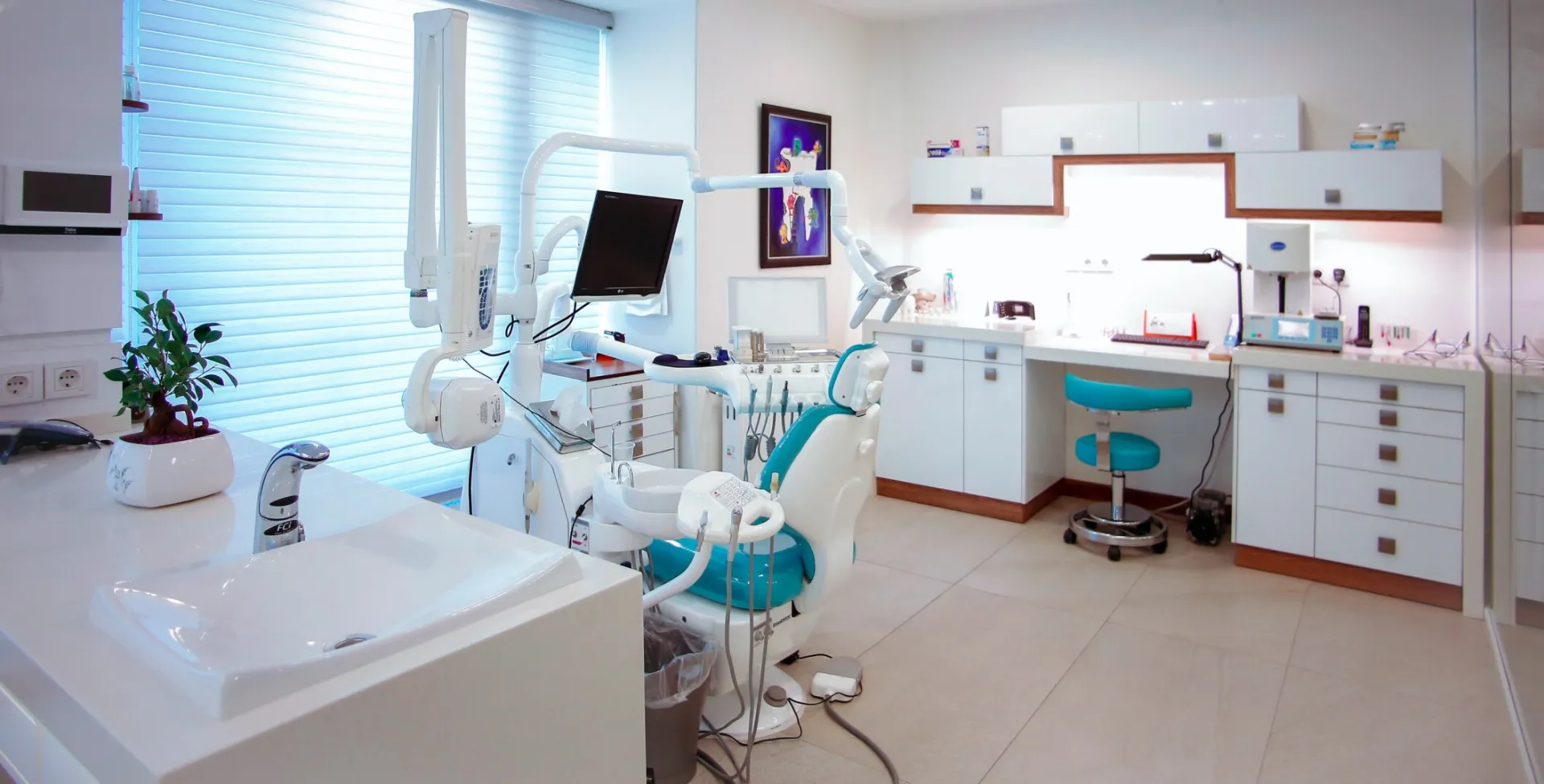 Professional team cleaning office interior including desks, floors, and glass surfaces in a bright commercial workspace